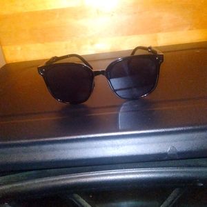Folding pair of sunglasses